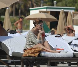 http://img224.imagevenue.com/loc1099/th_312757662_Mischa_Barton_Bikini_Candids_on_the_Beach_in_Miami_December_27_2011_243_122_1099lo.jpg