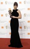 th_29211_Celebutopia-Penelope_Cruz_poses_with_her_award_after_winning_best_supporting_actress_at_the_BAFTA_2009-01_122_552lo.jpg