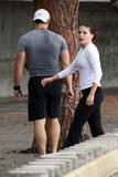 Sophia Bush streching her body at the tracks in Westwood to exercise for her next movie. Exercisign in tight black leggigns showing her ass.